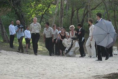 Pink didn't wear pink to her wedding, she wore cream! The barefoot couple wed on a beach in Costa Rica, with the bride walking down the aisle to Billy Joel's "She's Always a Woman". For their honeymoon they went snowboarding with their four dogs.