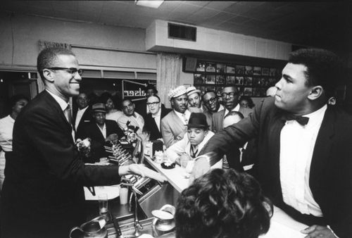 One Night In Miami, scene, recreation, Malcolm X and Cassius Clay surrounded by fans after he beat Sonny Liston for the heavyweight championship of the world in 1964.