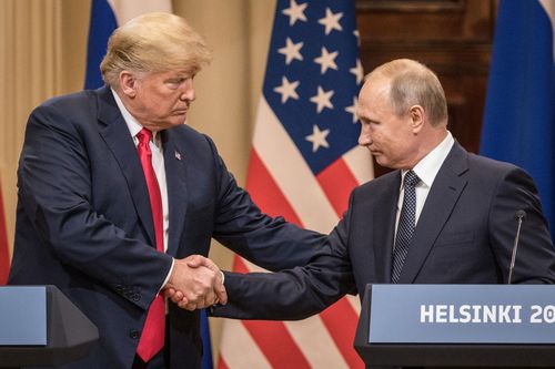 The two leaders were all smiles and handshakes but Mr Trump was criticised over his support for Mr Putin over his own intelligence agencies.