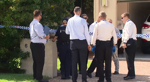 Police are scouring a Browns Plains home after a man received critical head injuries during a fight overnight.