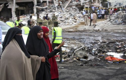 Somali women react at the scene of the blast, in Mogadishu, Somalia. (AP)