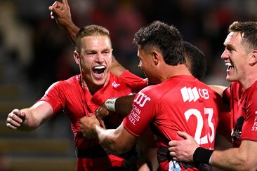 Johnny McNicholl of the Crusaders celebrates after scoring a try during the round six Super Rugby Pacific match between Crusaders and Chiefs.