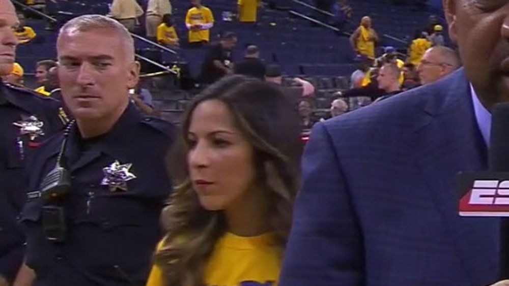 NBA Finals: Police officer caught ogling young woman