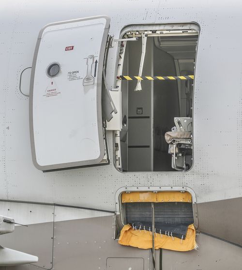 The emergency exit door of an Asiana Airlines plane is seen at the Daegu International Airport in Daegu, South Korea, Friday, May 26, 2023, after it was opened by a passenger during a flight.
