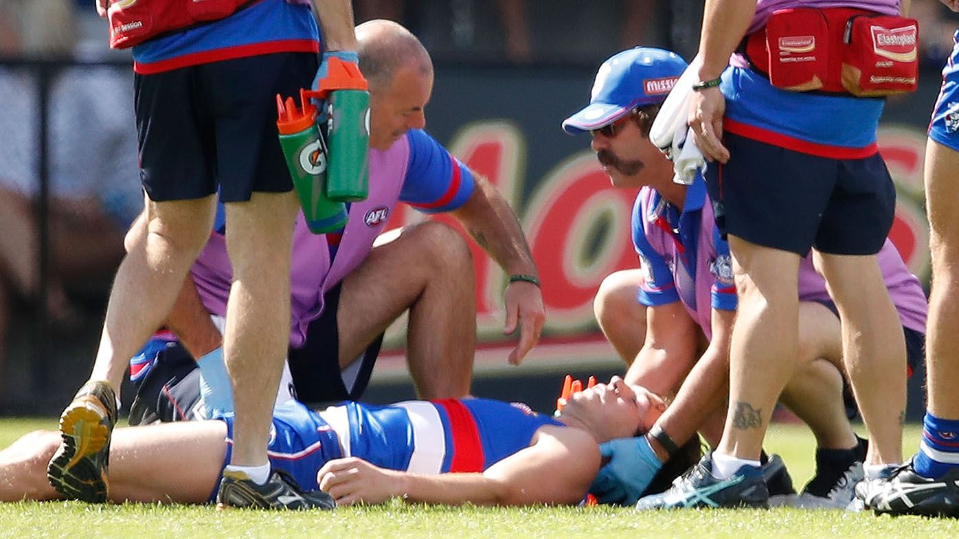 AFL: Western Bulldogs down Hawthorn Hawks, Liam Picken stretchered off with concussion