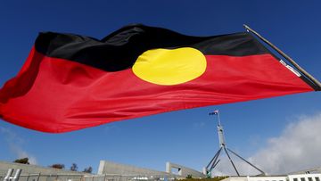 Aboriginal flag 'freed' for public use in $20m government copyright deal