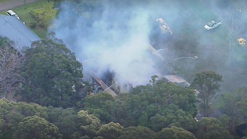 Dozens of detectives are on Russell Island south-east of Brisbane uncovering what caused the fire that killed a dad and five boys.Police have confirmed that "some elements" of the house fire that killed the children and their 34-year-old father require "closer scrutiny".