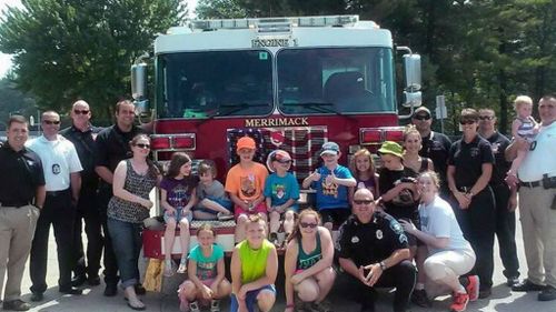 Police and firefighters surprise young boy ‘stood up’ by playmates