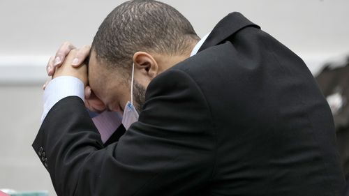 Darrell Brooks reacts as the guilty verdict is read during his trial in a Waukesha County Circuit Court in Waukesha, Wisconsin on Wednesday, October 26, 2022.