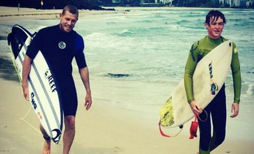 Mick Fanning and Ben Beasley on the beach at Snapper Rocks. (Instagram @benbeasley_)