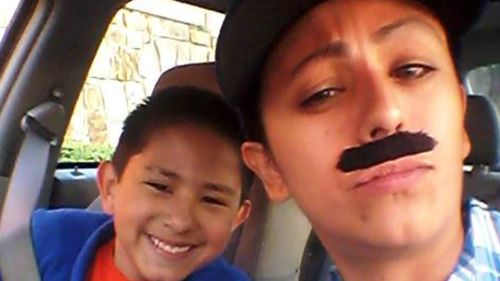 Single US mum dons moustache to get son free donuts at dads-only event 
