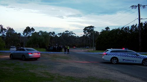 A crime scene has been established at Providence Road, Greenvale after a police car was rammed and a man was shot.