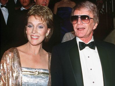 English singer and actress Julie Andrews with her husband Blake Edwards at a British Olympic Association gala, 18th April 1984.  (Photo by Kypros/Getty Images)