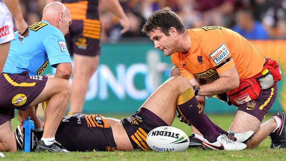 Andrew McCullough gets treated after injuring his hamstring. (Getty) 