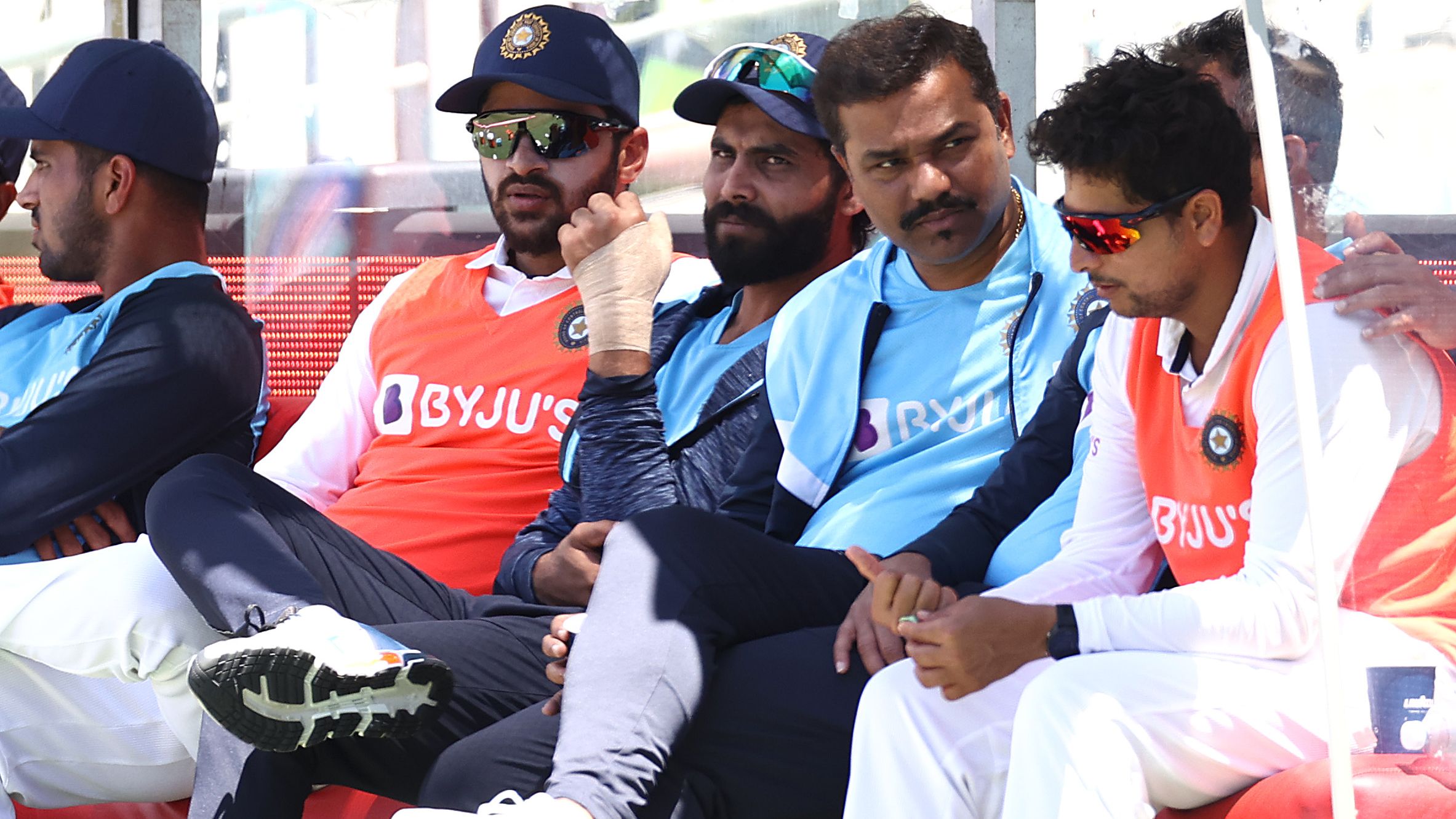 Ravindra Jadeja of India looks on after inuring his hand during day four.