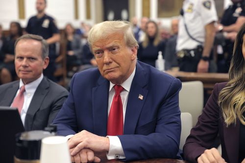 Former President Donald Trump sits in the courtroom with his legal team before the continuation of his civil business fraud trial at New York Supreme Court, Tuesday, Oct. 17, 2023, in New York