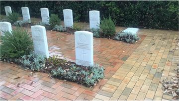 Police are investigating after five Military graves and a wall containing ashes were destroyed in Nowra Cemetery recently. 