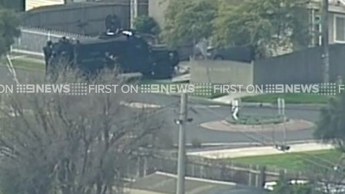 Heavily armed police surrounded a West Footscray property. (9NEWS)