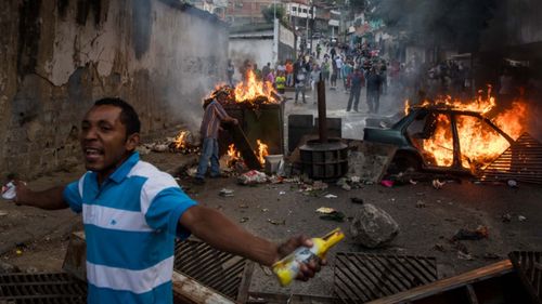 Venezuelans are marching in the streets to demand that President Maduro step down.