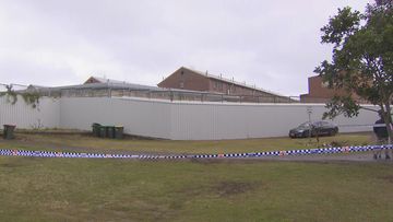 Small crime scene set up outside Long Bay jail after prisoner allegedly escaped and carjacked a woman.