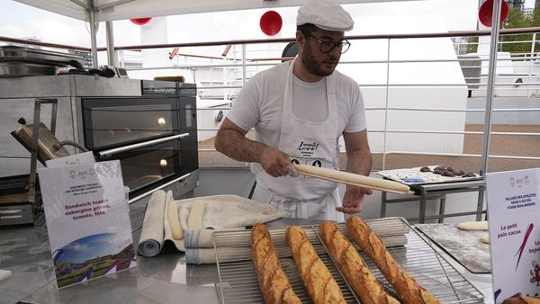 French baker Tony Dore prepares baguettes, like those that will be served during the. Olympic Games, Tuesday, April 30, 2024 in Paris. 