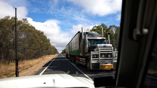 A truck drives in outback Queensland on the way to Adelaide.