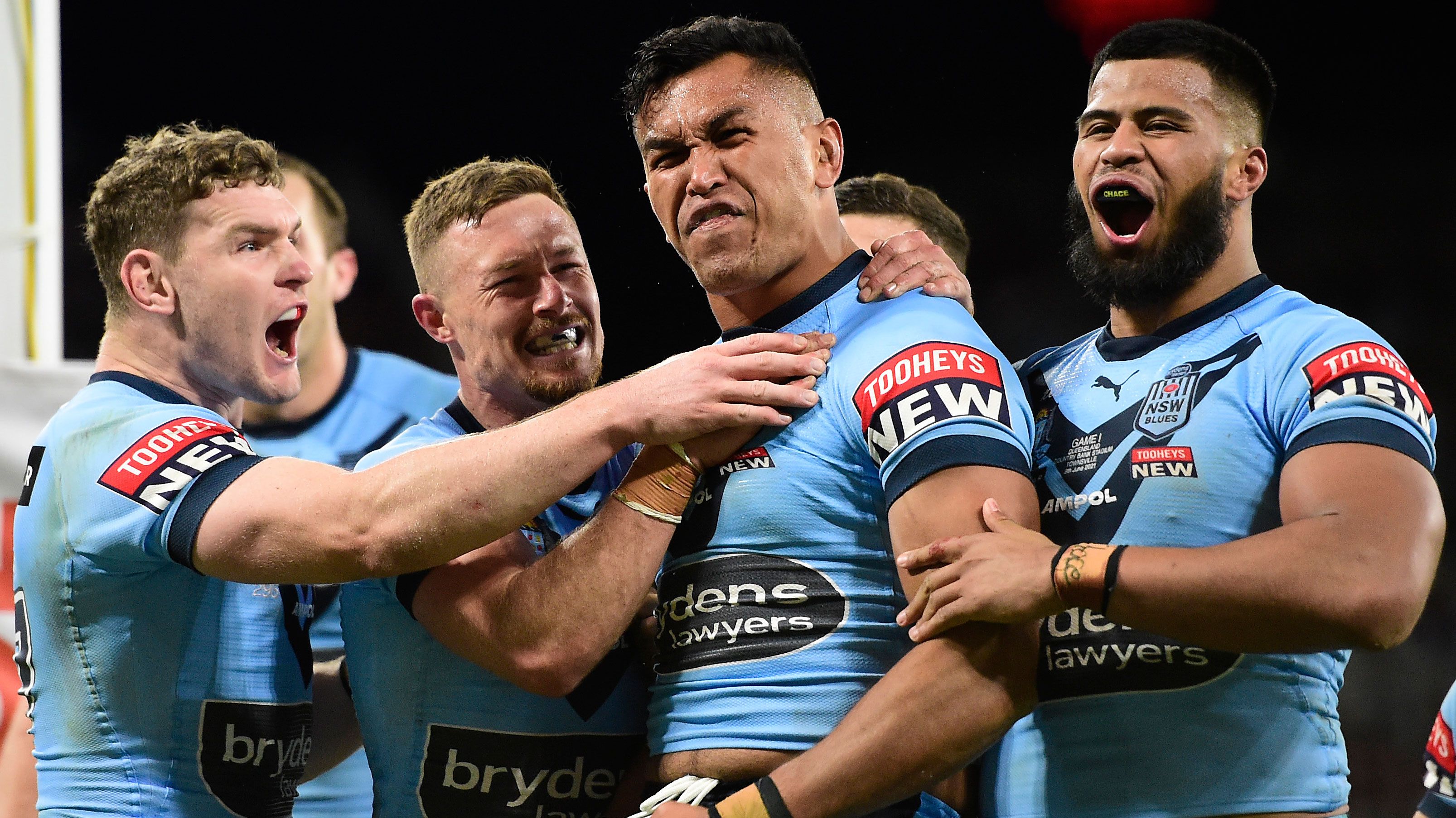 Blues players celebrate a try during the 2021 State of Origin series.