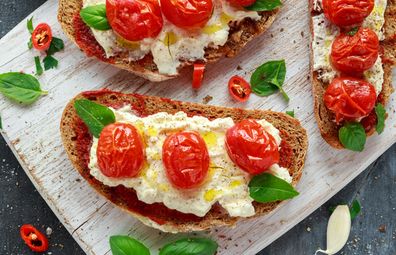 Cottage cheese and roast tomato on toast