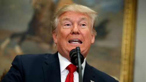 President Donald Trump speaks before signing an executive order on healthcare in the Roosevelt Room of the White House in Washington. (AAP)