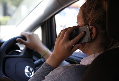 Drivers who talk on their phones are twice as likely to be involved in an accident. Picture: AAP