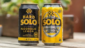 A can of Hard Solo next to a can of the soft drink Solo.