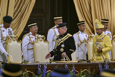 Sultan Ibrahim Sultan Iskandar, center, arrives for the oath taking ceremony as the Malaysias 17th king at the National Palace in Kuala Lumpur in Kuala Lumpur, Malaysia Wednesday, Jan. 31, 2024.  