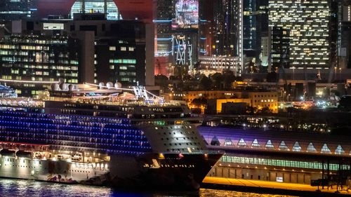 The World Dream cruise ship sits moored at Kai Tak Cruise Terminal on February 5, 2020 in Hong Kong, China. 