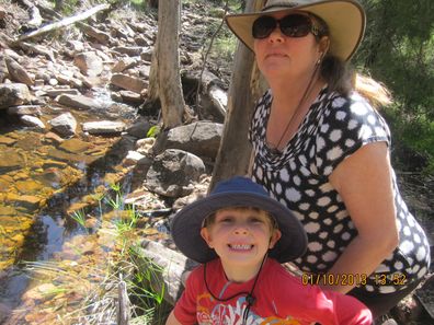 Karen hiking with son