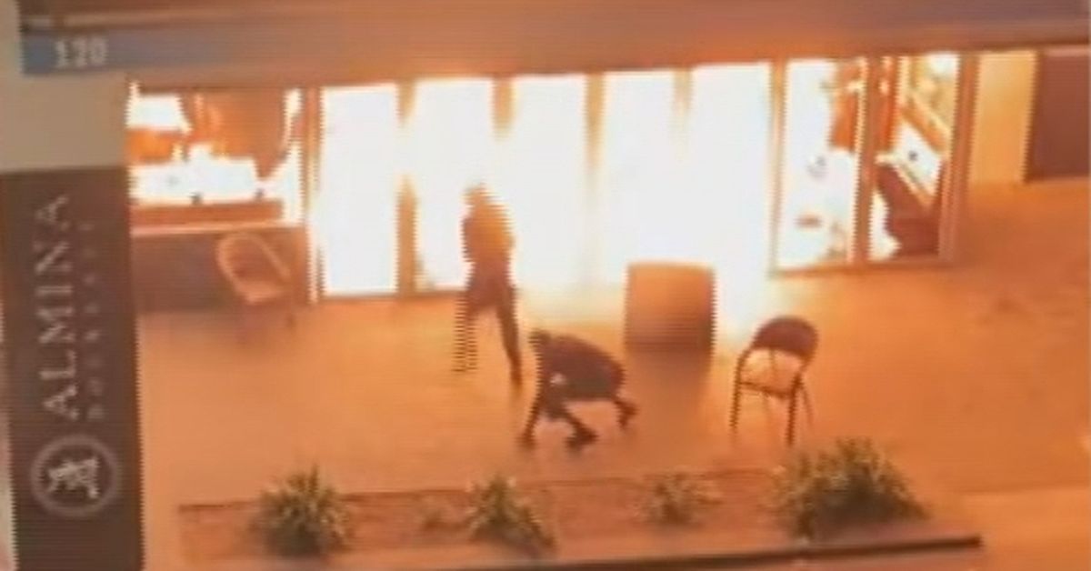 Two charged after Melbourne restaurant torched in arson attack