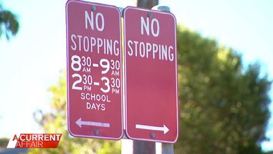 Parents line up half an hour before and after school on a roadway clearly marked either "no standing" or "no stopping".