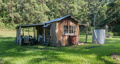 Buyer $1.5 million foldable timber shack sold Queensland Domain 