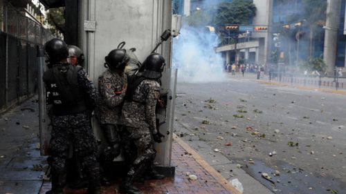 Police fired tear gas against anti-government protesters.