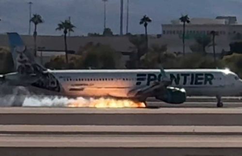 Video captured the moment when fire was seen underneath a Frontier flight as it landed at Harry Reid International Airport in Las Vegas.
