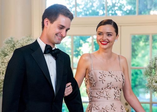 Miranda Kerr (right) got hitched to Snapchat billionaire Evan Spiege. (AAP)