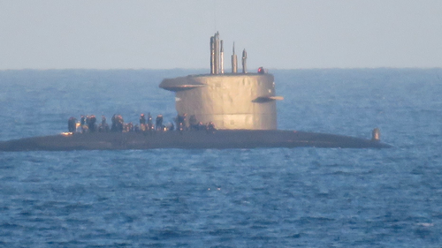 A local took this photo as the submarine drifted by the town.