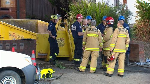 It was a long and difficult process for fire crews, as Mr Eisler's home was full to the ceiling with books and furniture making it hard to enter. (9NEWS)