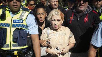 Anti-trans activist Kellie-Jay Keen, aka Posie Parker, was escorted out of Albert Park by police.