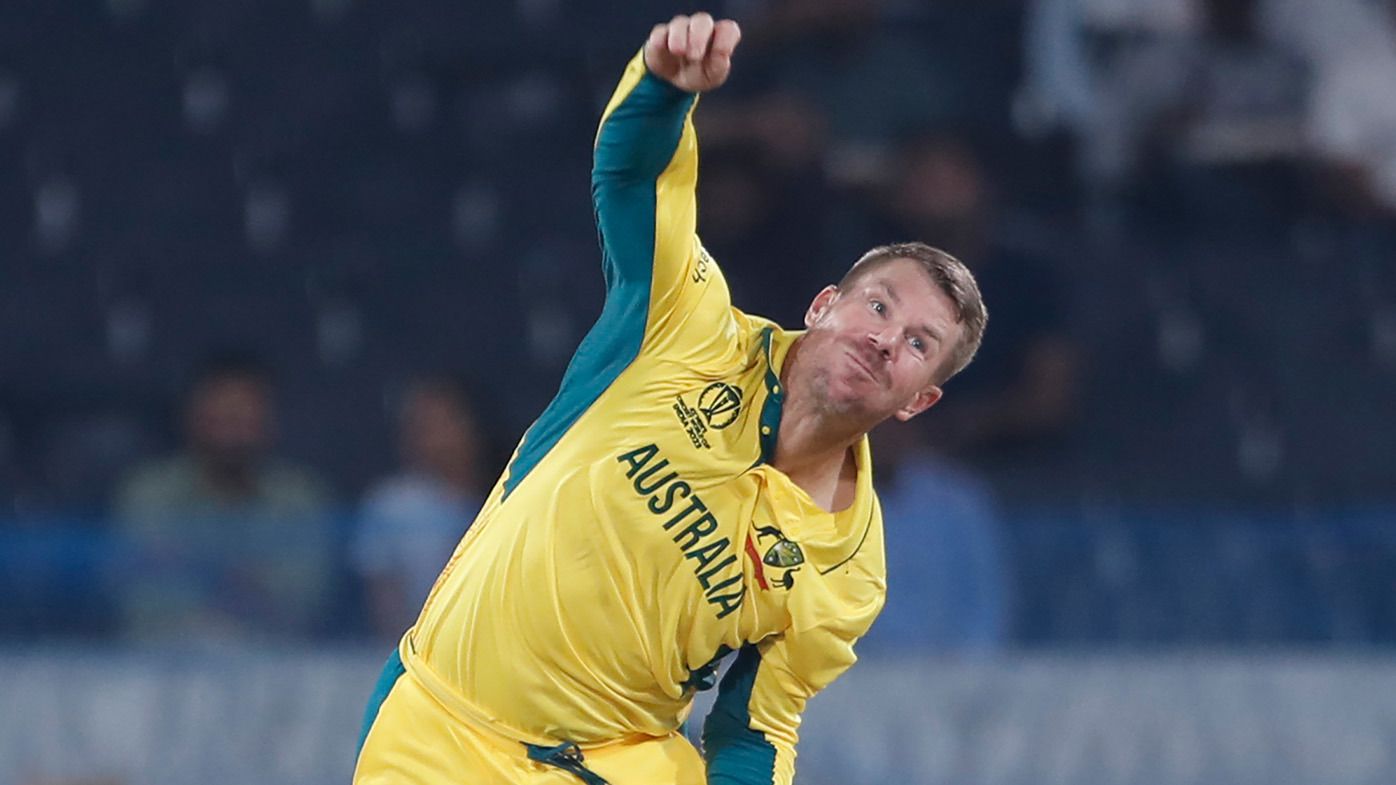 David Warner rolling the arm over in Australia&#x27;s warm-up match against Pakistan.