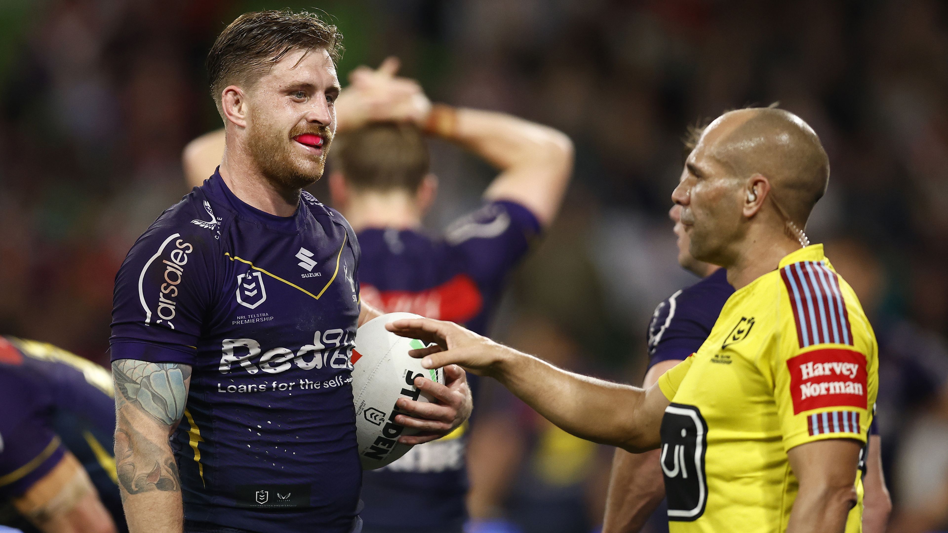 MELBOURNE, AUSTRALIA - SEPTEMBER 15:  Cameron Munster of the Storm reacts during the NRL Semi Final match between Melbourne Storm and the Sydney Roosters at AAMI Park on September 15, 2023 in Melbourne, Australia. (Photo by Daniel Pockett/Getty Images)