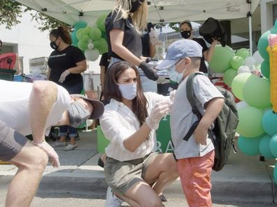 Harry and Meghan volunteering at Baby2Baby event in LA