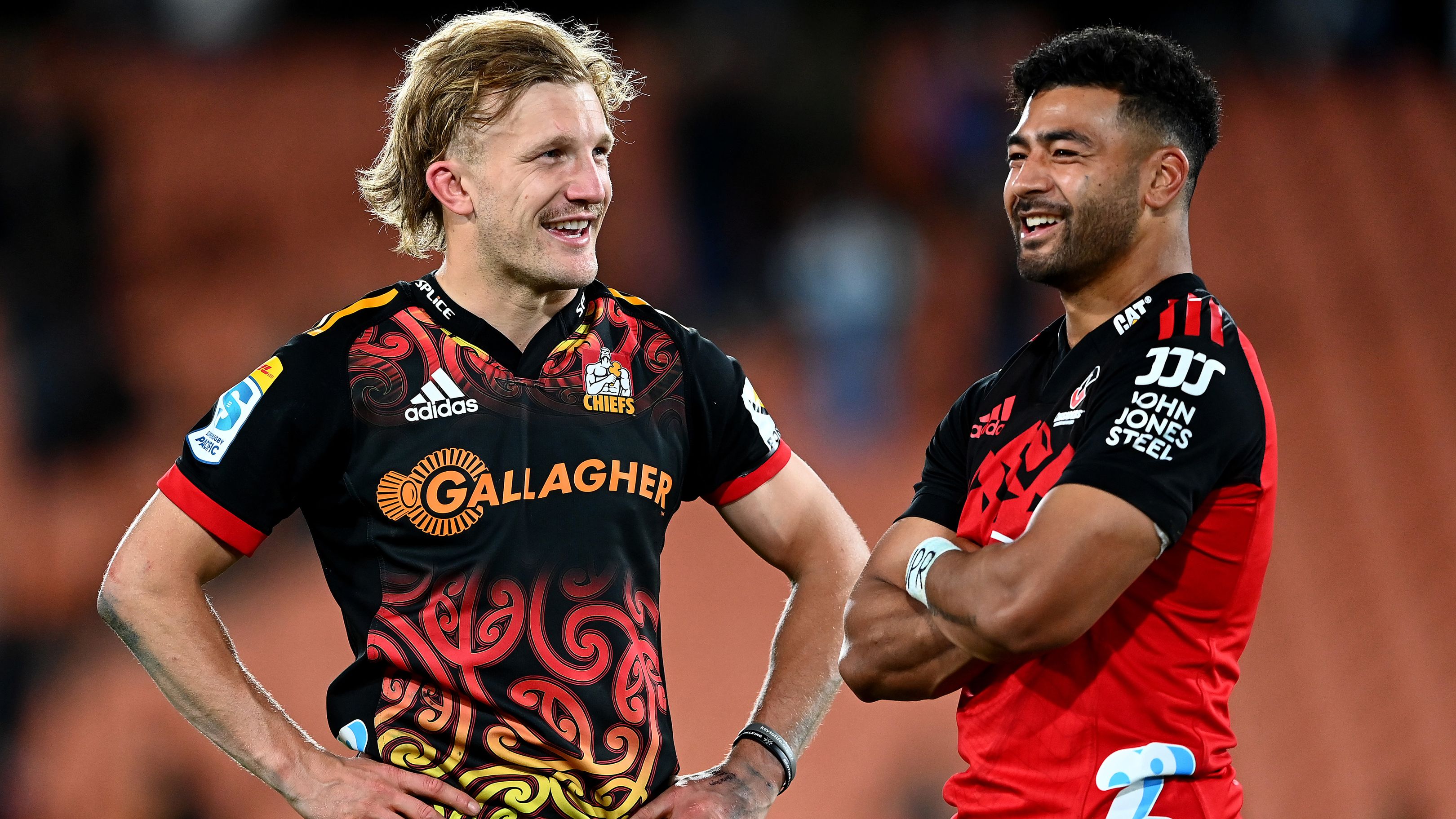 Damian McKenzie of the Chiefs and Richie Mo&#x27;unga of the Crusaders talk.