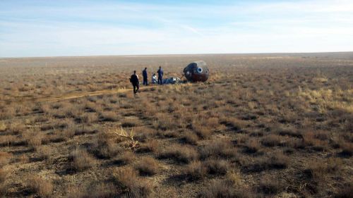 The Soyuz MS-10 space capsule lays in a field after an emergency landing near Dzhezkazgan, about 450 kilometres from the launch site.