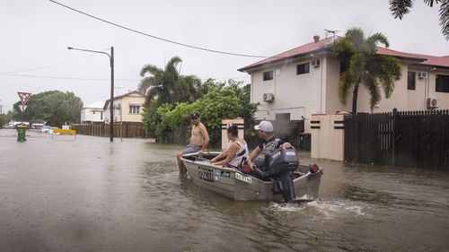 Residents in Townsville are being asked to seek higher ground amid flash-flooding danger