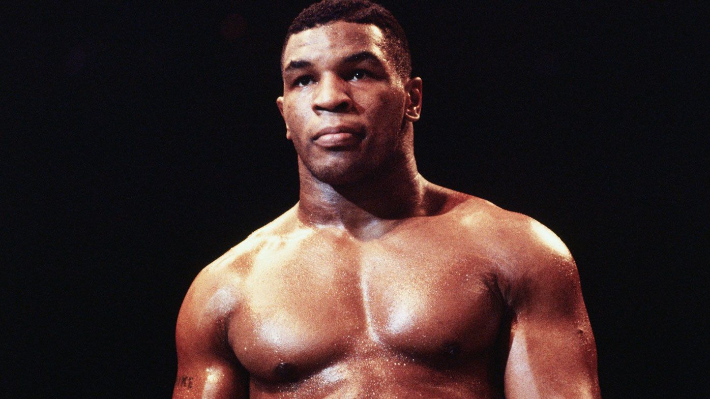 A young Mike Tyson announces himself on the world stage. (Getty)
